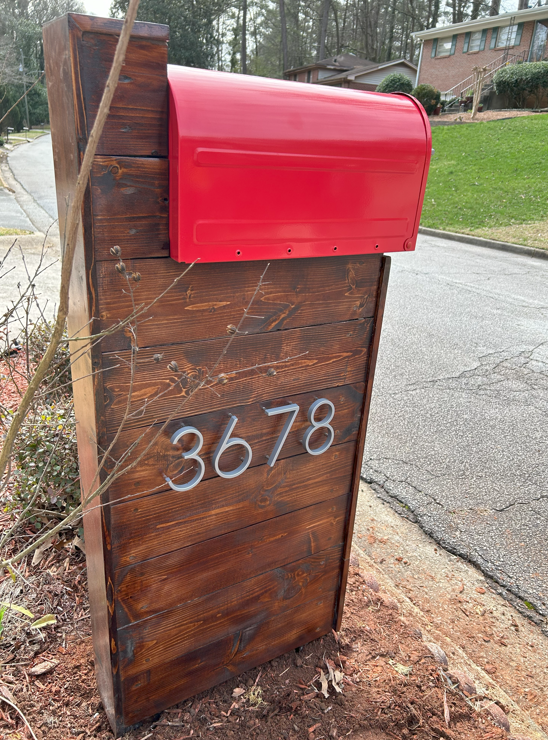 Special walnut mailbox with red box
